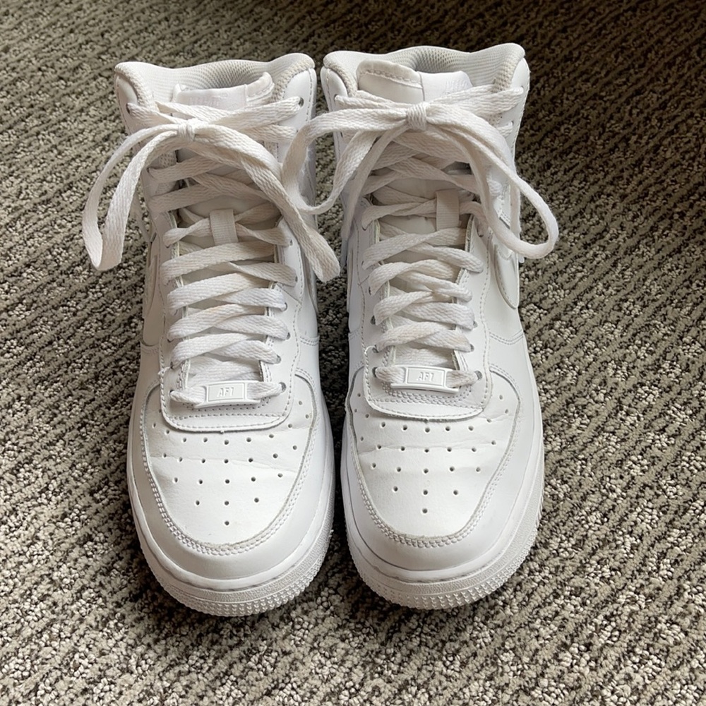 Nike Air Force 1 high tops.
